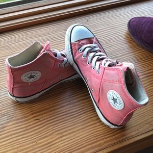 All star Converse high tops.